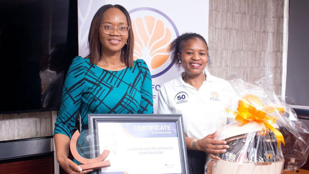 Eswatini Water Services Corporation Managing Director Jabulile Mashwama receiving the recognition certificate from ENPF CEO Futhi Tembe.